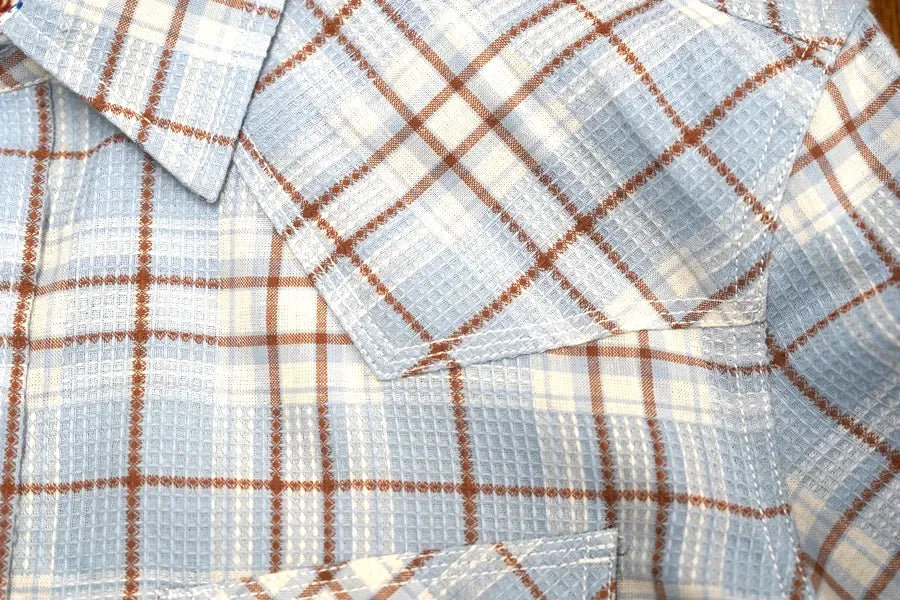 Close-up of a Journal Western shirt highlighting the performance fabric on the back yoke panel.
